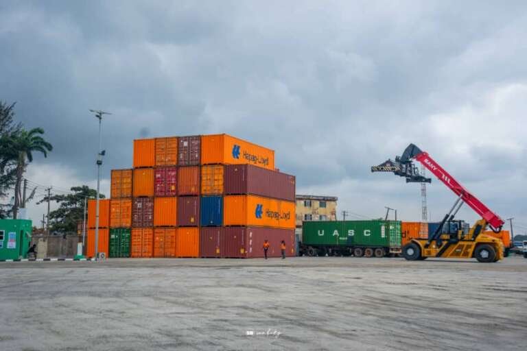 Hezegovin container yard with reach stacker